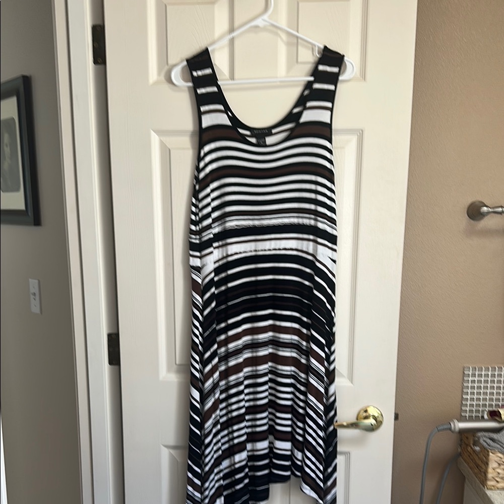Classic cute summer dress with flattering strips and
Asymmetrical bottom